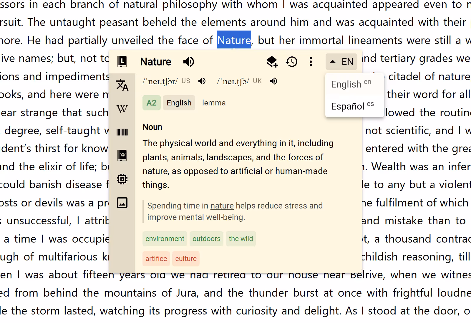 A normal unpinned Lumtionary Bubble over selected text with the English and Spanish result-language picker open